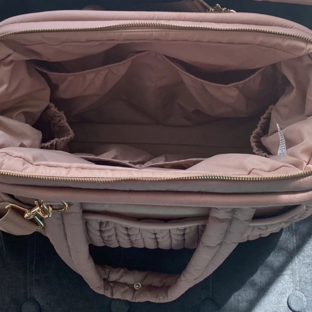 Pre owned Happ Brand Paige Caryall Diaper bag slight stain I can see in pic
